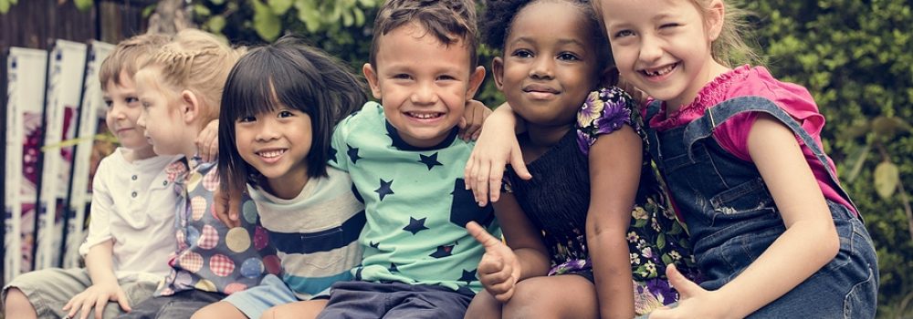 Group Of Diverse Kids Sitting Together